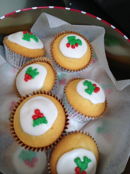 My cousin's vanilla cupcakes with holly decoration