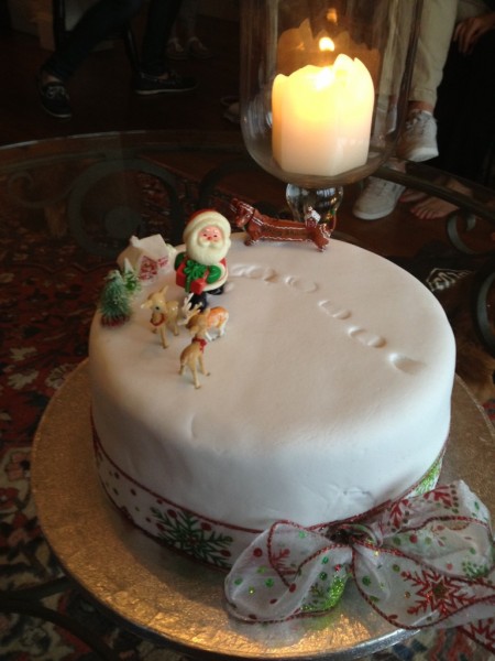 A Christmas Cake decorated by a six-year old complete with Santa's footsteps