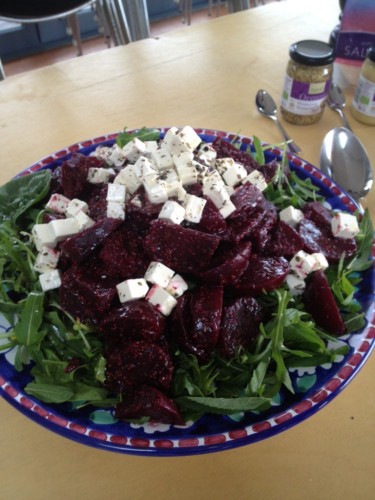 Roasted beetroot salad on a bed of rocket with marinated feta 