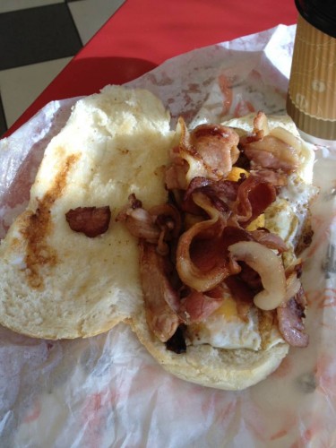 This is a bacon and egg roll.  I believe the roll was microwaved.  The eggs overcooked, the bacon thrown onto the bun and no sauce to speak of.  