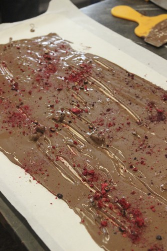 The finished chocolate slab after being sprinkled with freeze-dried berries