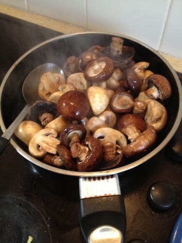 Sauteing the mushrooms in butter - no need to chop them, they are better kept whole 