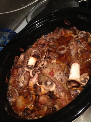 Lamb shanks slow cooking in the slow cooker