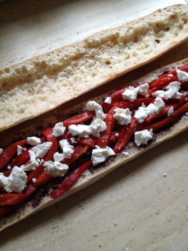 Layered in roasted capsicum strips and crumbled goat's cheese