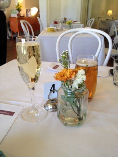 A glass of Chandon Brut and I think jars with flowers from the property is a lovely touch