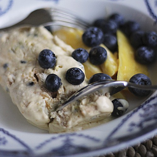 Served with blueberries and mango