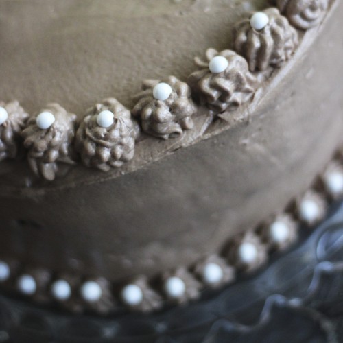 Decorated with Rosettes and pearls