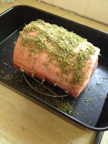 Stuffed pork loin rolled and tied with string