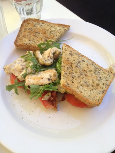 Gluten-Free toasted sandwich with chicken, tomato, avocado, rocket and caramelised onions