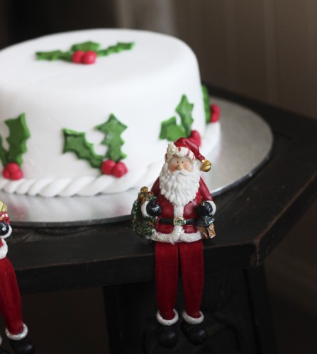 A Christmas Cake guarded fiercely by Santas