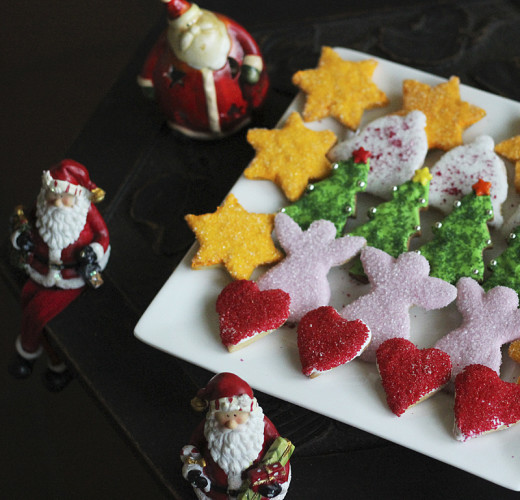 A mixed platter of hearts, angels, Christmas trees, Christmas Bells and stars 