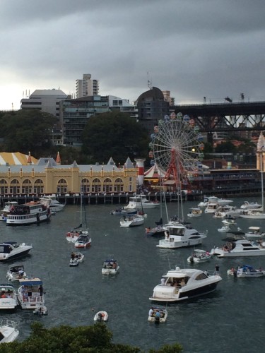 Anchored boats waiting for the show to begin and across the water is Luna Park.  