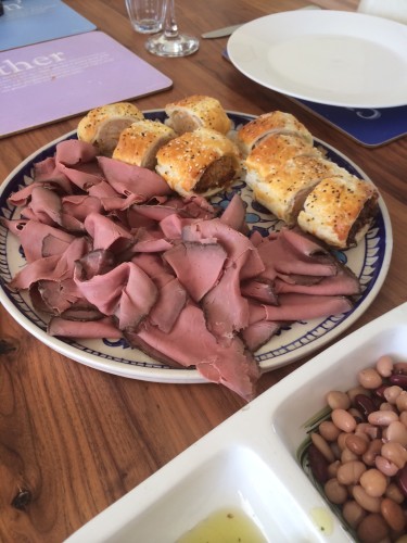 Sausage rolls and rare roast beef