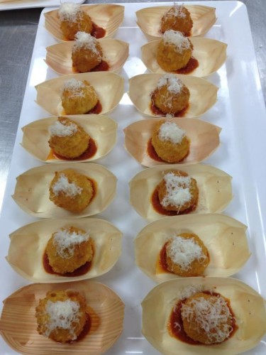 Smoked cheese and roast pumpkin risotto balls with Napoli sauce and parmesan snow 