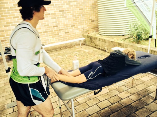 Getting treated by physios after two of his races 