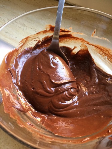 Three types of chocolate melted with butter