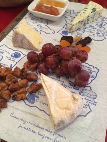 Cheese and fruit served on a map of France