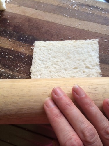 Rolling the bread to flatten it a little