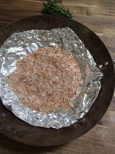 Hickory sawdust mixed with grains of rice