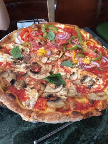 A half-and-half vegetarian pizza 