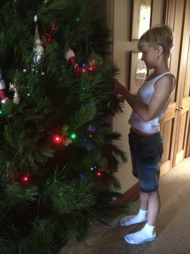 Helping me decorate the tree
