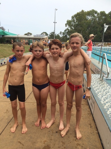 Alfie in the relay team at the swimming carnival
