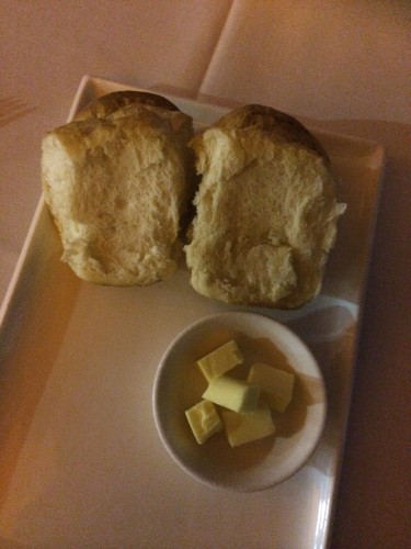 Warm bread rolls with butter