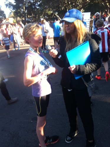 Being interviewed after finishing the 5km