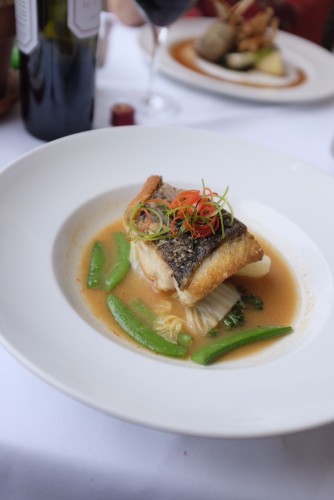 Pan- fried Cone Bay Barramundi fillet, Thai sour curry broth with fresh Parklands vegetables finished with lime leaves