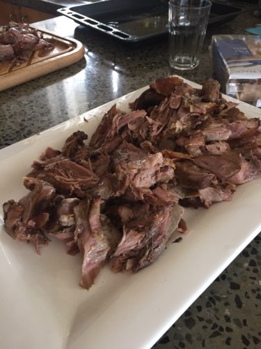 Marinated and slow-cooked shoulders of lamb